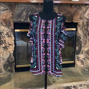 Floral top with cut out shoulder